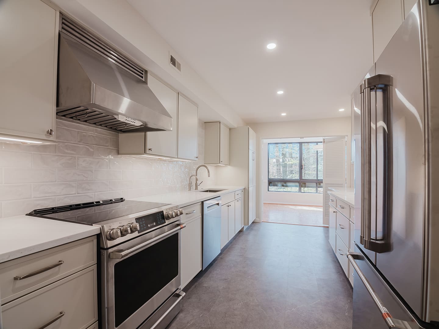 Kitchen remodel completed by DMV General Contracting Group in Bethesda MD —custom cabinetry and quartz countertops